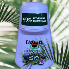 Ushuaïa Organic Roll‑On Deodorant with lavender‑colored cap, featuring acai berry extract; aluminum‑free, 99% natural origin ingredients, certified organic, 48‑hour protection, eco‑friendly packaging with reduced plastic and recyclable bottle.