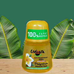 Ushuaia Roll‑on deodorant with bright yellow cap and green label, featuring Polynesian monoi oil and tiare flower extract; vegan formula with natural ingredients, 48‑hour protection, eco‑friendly packaging with 100% recycled cap and recyclable bottle.