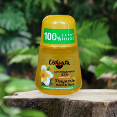 Ushuaia Roll‑on deodorant with bright yellow cap and green label, featuring Polynesian monoi oil and tiare flower extract; vegan formula with natural ingredients, 48‑hour protection, eco‑friendly packaging with 100% recycled cap and recyclable bottle.