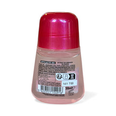 Ushuaia Roll-on deodorant with red cap and green label, featuring Moroccan pomegranate extract; eco-conscious packaging with 100% recycled cap and 48-hour protection claim, photographed to highlight natural ingredients and vibrant pink liquid.