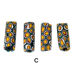 A set of vintage Venetian millefiori African trade beads in vibrant green and yellow. The tube-shaped glass beads, originating from Ghana, feature intricate floral patterns and showcase the rich history of 19th and 20th-century trade. Some beads show minor chips due to age, adding to their authentic vintage charm.
