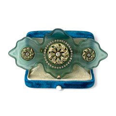 Vintage Vogue Bijoux green resin statement brooch with gold‑tone floral motifs and clear rhinestones.