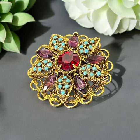 Vintage 1950s European Brass Filigree Floral Brooch with Dark Amethyst, Red, and Turquoise Rhinestones