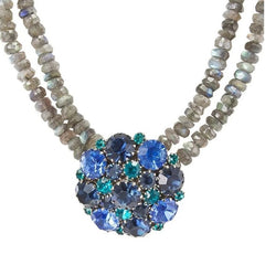  A stunning vintage Weiss crystal dome brooch in shades of blue and teal, paired with a double strand of shiny blue and gray faceted labradorite rondelles. The brooch can be worn centered, off-center, or separately, offering versatile styling. Finished with sterling silver spacers and a toggle clasp, this unique piece blends vintage charm with modern craftsmanship, signed Weiss on the back and featuring the EM tag in Etruscan alphabet for Elisabeth Michel-Meyrueix.
