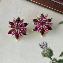 Vintage Weiss fuchsia rhinestone floral brooch and matching clip‑on earrings in light gold tone with layered petal design.