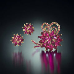 Vintage Weiss fuchsia rhinestone floral brooch and matching clip‑on earrings in light gold tone with layered petal design.