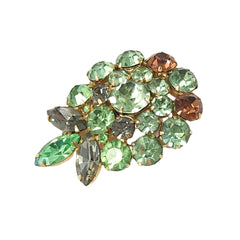 Vintage Weiss green and smoked topaz rhinestone teardrop brooch with gold‑tone setting.