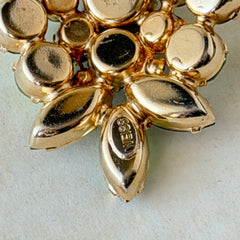Vintage Weiss green and smoked topaz rhinestone teardrop brooch with gold‑tone setting.