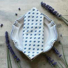 Provence cotton napkins in white with blue floral pattern from the Le Cluny Lisa French Country Collection.