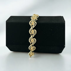 Vintage 1950s white enamel and gold-tone necklace and bracelet set with openwork textured wire design, adjustable hook clasp necklace and snap lock bracelet, in very good condition with light enamel wear.