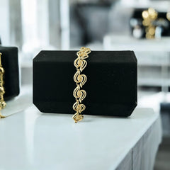 Vintage 1950s white enamel and gold-tone necklace and bracelet set with openwork textured wire design, adjustable hook clasp necklace and snap lock bracelet, in very good condition with light enamel wear.