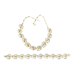 Vintage 1950s white enamel and gold-tone necklace and bracelet set with openwork textured wire design, adjustable hook clasp necklace and snap lock bracelet, in very good condition with light enamel wear.
