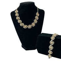 Vintage 1950s white enamel and gold-tone necklace and bracelet set with openwork textured wire design, adjustable hook clasp necklace and snap lock bracelet, in very good condition with light enamel wear.